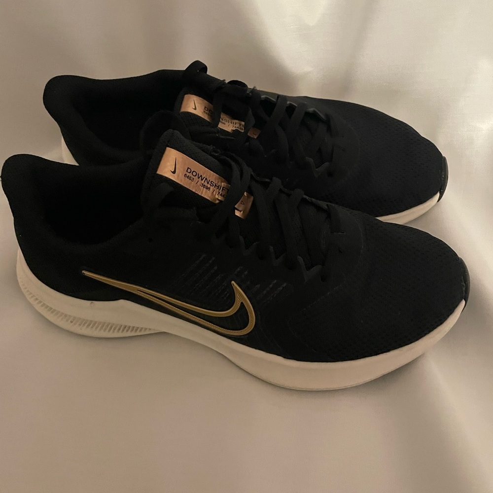 Gold and Black Nike Running Sneakers